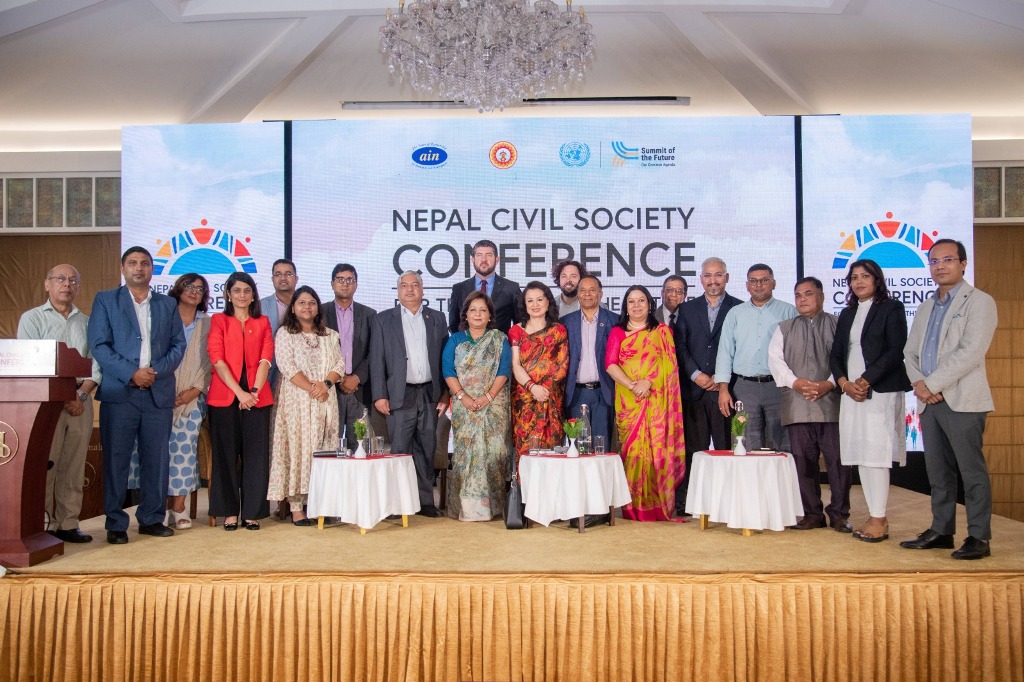 Group-photo-team-with-the-Chief-Guest,-Honorable-Minister-of-Foreign-Affairs,-Mrs.-Aarju-Deuba-Rana,-at-the-Nepal-Civil-Society-Conference-for-the-Summit of the Future.-(1)-1726331820.jpg